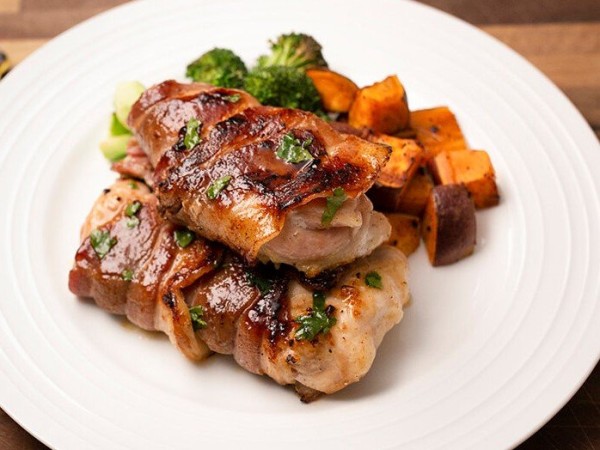 Glazed Bacon Wrapped Thighs With Roasted Vegetables
