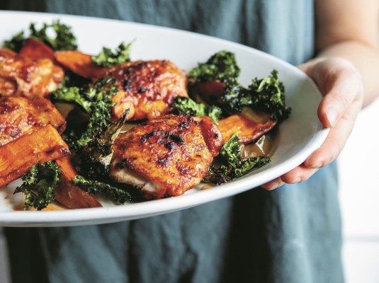 Paprika Chicken With Sweet Potatoes And A Crispy Kale Crown in the plate