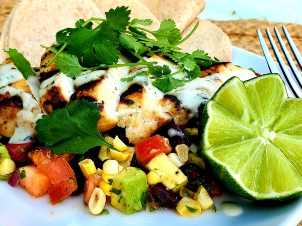 Grilled Tequila Lime Chicken with Corn, Avocado, Tomato & Black Bean Salad and Avocado Crema