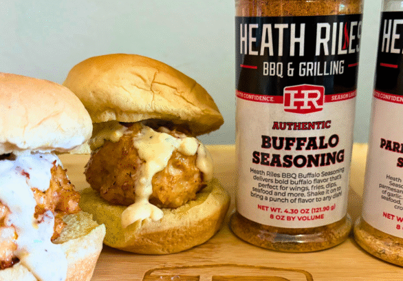 Buffalo Chicken Sliders with Parmesan Garlic Aioli made with Springer Mountain Farms chicken, served on soft slider buns and topped with fresh aioli for a flavorful game day or tailgate recipe.