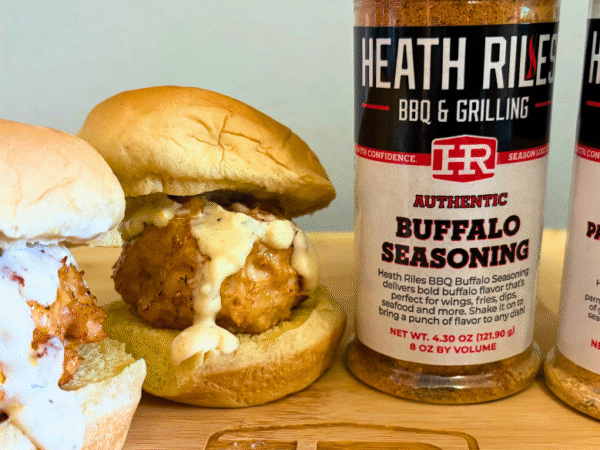 Buffalo Chicken Sliders with Parmesan Garlic Aioli made with Springer Mountain Farms chicken, served on soft slider buns and topped with fresh aioli for a flavorful game day or tailgate recipe.