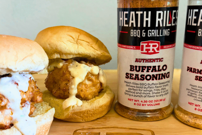 Buffalo Chicken Sliders with Parmesan Garlic Aioli made with Springer Mountain Farms chicken, served on soft slider buns and topped with fresh aioli for a flavorful game day or tailgate recipe.
