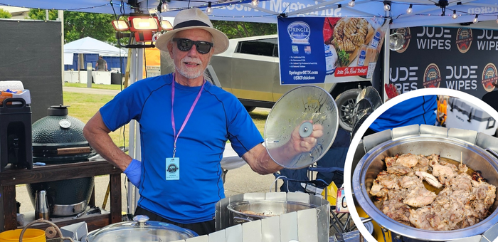 Chef Jonathan stands smiling under a festival tent at Memphis in May, wearing a blue shirt, sunglasses, and a straw hat, holding up a lid over a hot pan of Springer Mountain Farms chicken. Behind him, grills, banners, and cooking equipment are visible. Inset shows a close-up of seasoned grilled chicken in a metal serving pan.