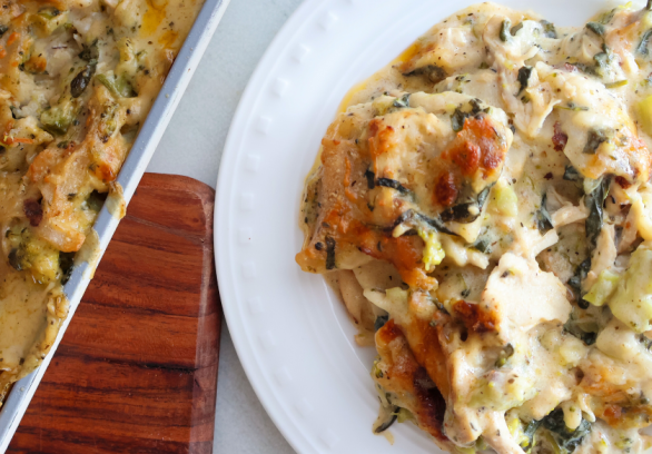 Creamy chicken and broccoli sheet pan lasagna served on a white plate – easy weeknight baked chicken pasta dinner