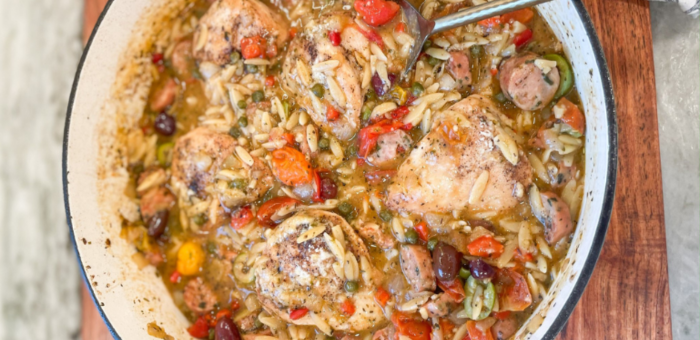 Rustic Chicken Italiano made with Springer Mountain Farms chicken thighs, orzo pasta, roasted red peppers, olives, and Italian sausage in a savory tomato-herb sauce.