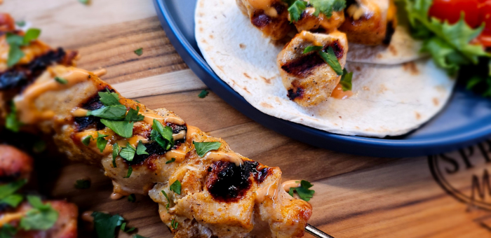 Bang Bang grilled chicken tacos with grilled chicken creamy spicy sauce and fresh cilantro